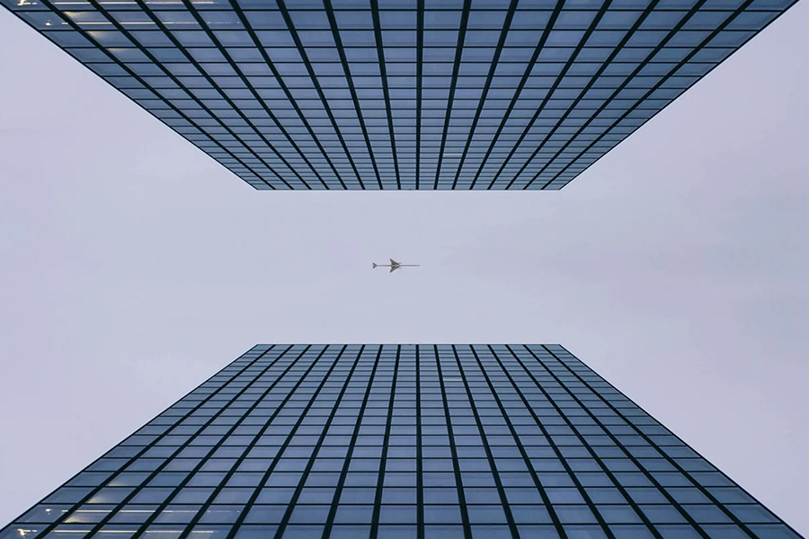 buildings with plane between