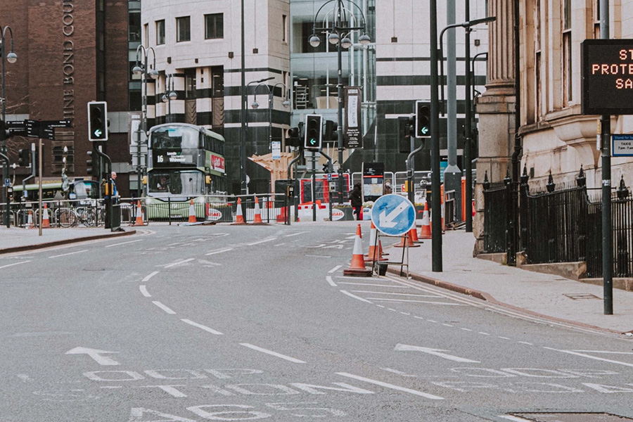 Road turn with cones and signs