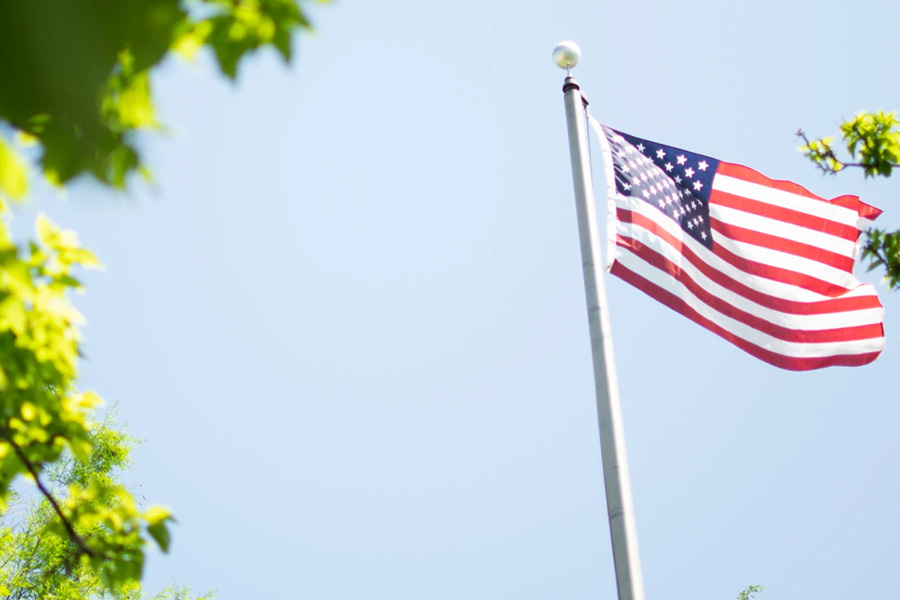 American flag blowing in wind