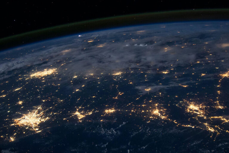 earth with cities lit up