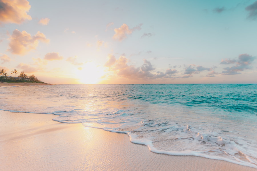 sun over tropical beach