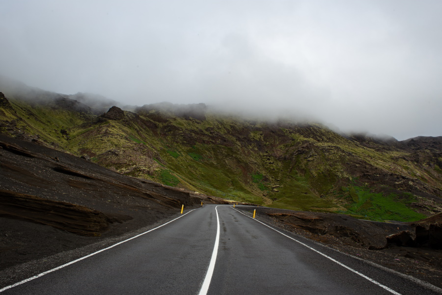 road with clouds in distance