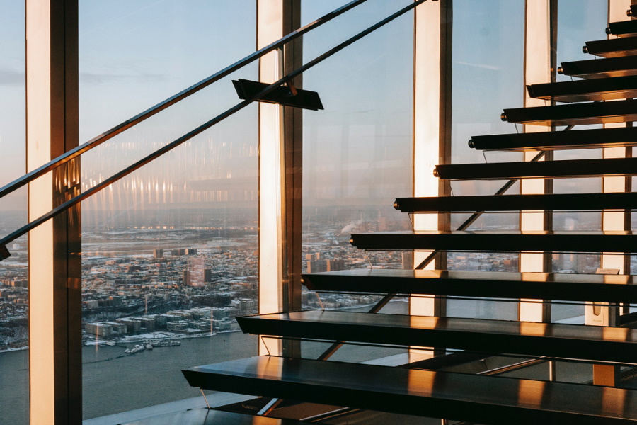 Staircase with city riverside view