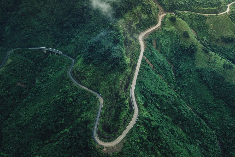 winding road through green mountains